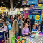 Families exploring interactive toy booths at the Chicago Toy and Game Fair 2026 inside the Donald E. Stephens Convention Center