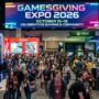 GamesGiving Expo 2026 gaming convention floor with exhibitor booths and attendees